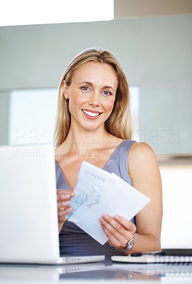 Successful young businesss woman holding a envelope
