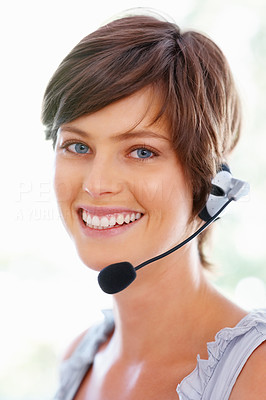 Young call center executive smiling