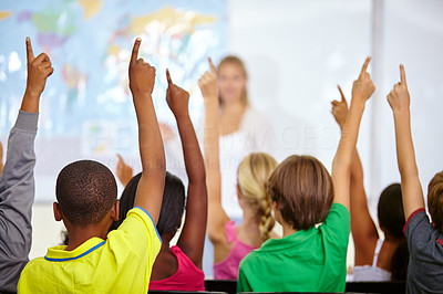 Eager young minds ready to answer all their teacher\'s questions