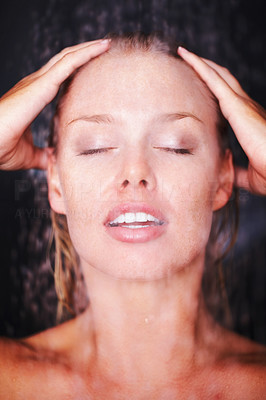 Closeup of a lovely woman taking a shower