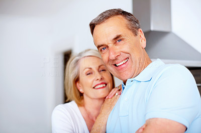 Cheerful retired man with wife spending time together