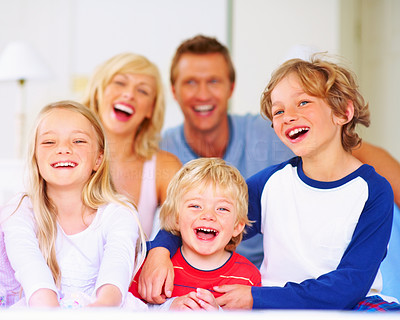 Happy family - Cheerful middle aged couple with their children