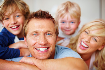 Smiling mature man spending good time with his family