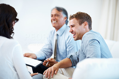 Happy man and woman meeting with financial advisor