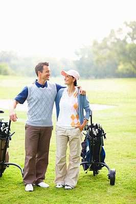 Happy couple on golf course