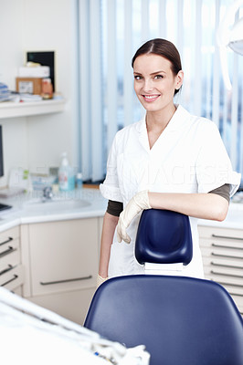 Smiling dental assistant