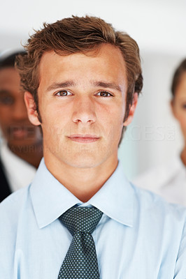 Young business man with people in background
