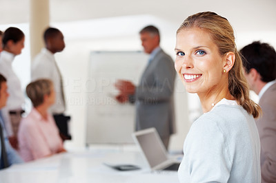 Charming young business woman during a presentation