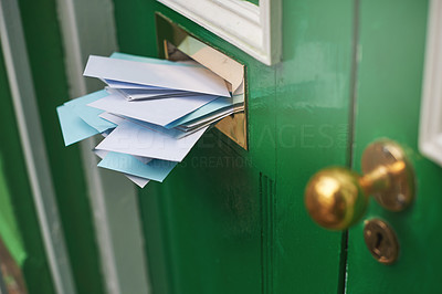 An entranceway filled with envelopes