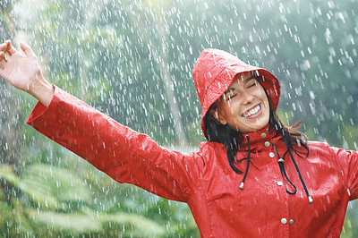 Woman playing in rain