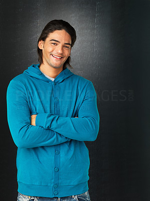 Man in sweatshirt with arms folded