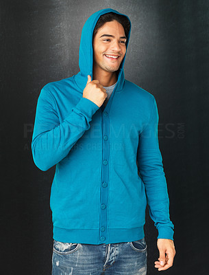 Attractive man in blue hooded sweatshirt