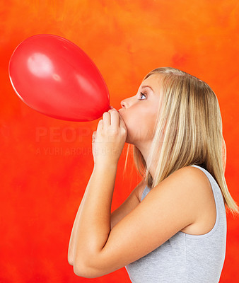 Blowing balloon