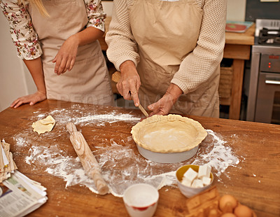 Adding the finishing touches before baking