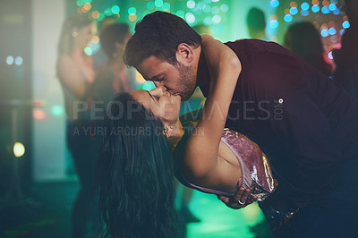 Stealing a kiss on the dance floor