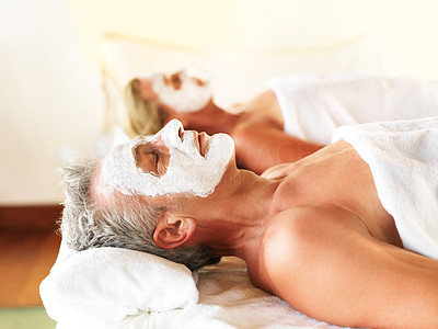 Mature couple in spa treatment