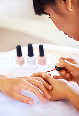 Beautician doing a manicure