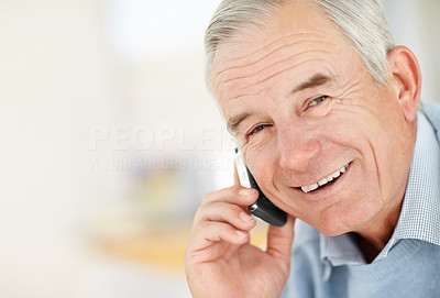 Mature man talking on the mobile phone
