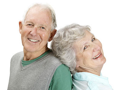 Portrait of happy old couple back to back