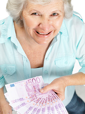 Senior woman holding money in hand - Top view