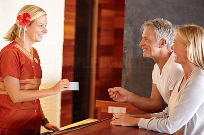 Couple at hotel reception