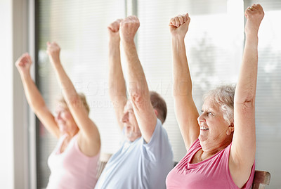 Elderly people doing exercises