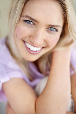 Portrait of a happy young lady smiling