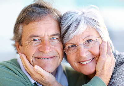 Portrait of happy old couple smiling together