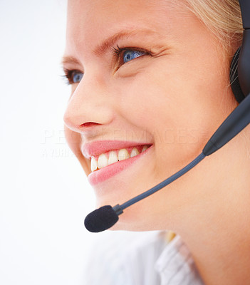 Portrait of a happy business woman wearing headset isolated on white background