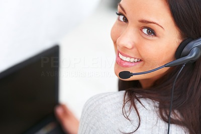 Closeup portrait of cute young female with headphones and laptop on white background