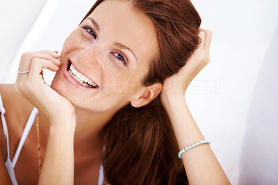 Closeup of relaxed young lady smiling