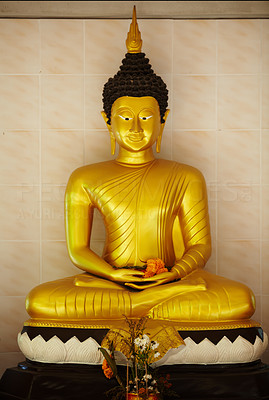 Golden Buddha in meditation mudra