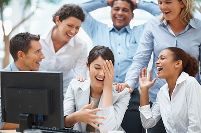 Colleagues laughing at funny email