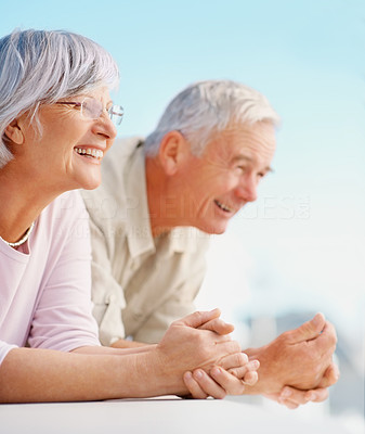 A retired elderly couple having a good time together