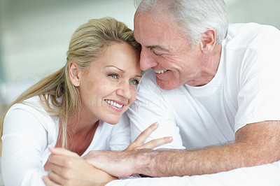 Closeup of a romantic couple lying in bed