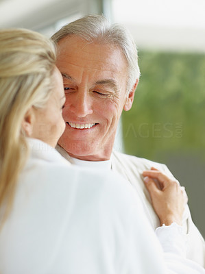 Closeup of a mature romantic couple looking at each other