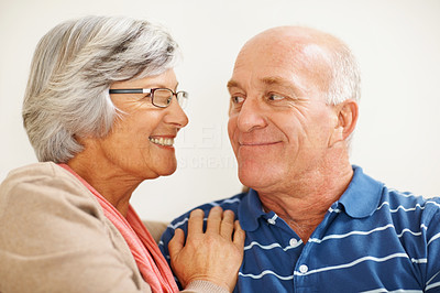 Closeup of a loving senior couple looking at each other