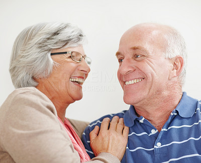 Closeup of a romantic senior couple looking at each other