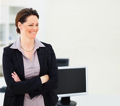 Happy business woman with hands folded , looking away