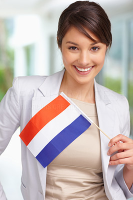 Portrait of a beautiful female with the Netherlands flag