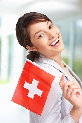 Lovely young female with Switzerland\'s flag