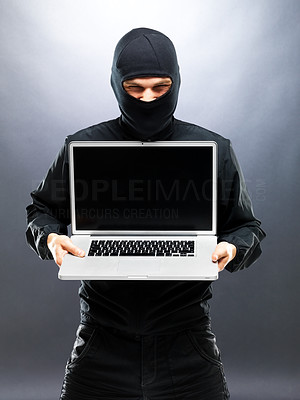 Computer hacker - Robber stealing information from laptop