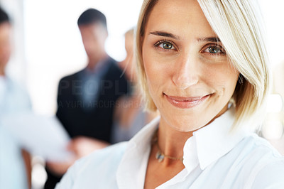Young business lady looking happy at office