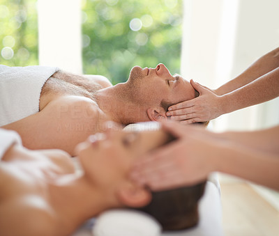 Getting a relaxing massage with his wife