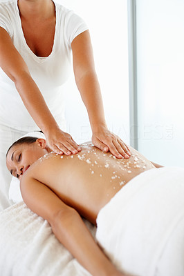 Female getting salt treatment at the spa