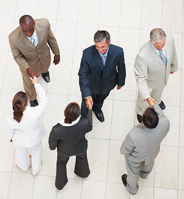 Top view of a business colleagues shaking hands