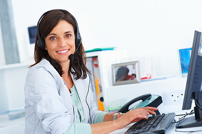 Beautiful charming gorgeous businesswoman communicating on headset