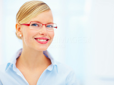 Closeup of happy beautiful woman wearing red color glasses