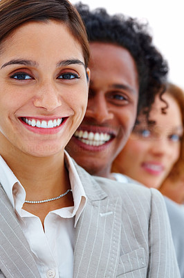 Closeup of smiling business people in a row