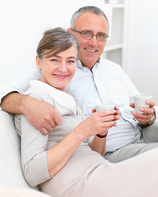 Romantic older couple sitting together
